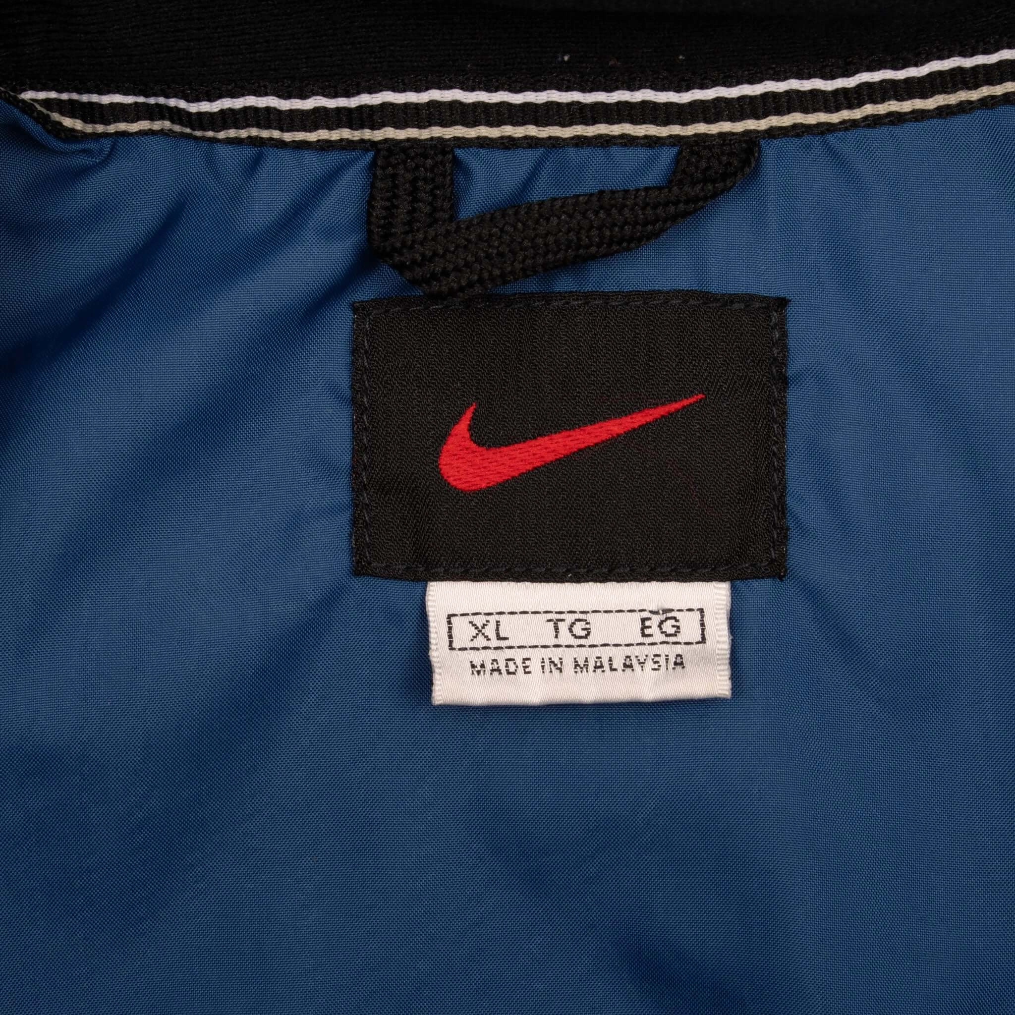 VINTAGE NIKE CLASSIC SWOOSH BLUE WINDBREAKER JACKET 1990S XL