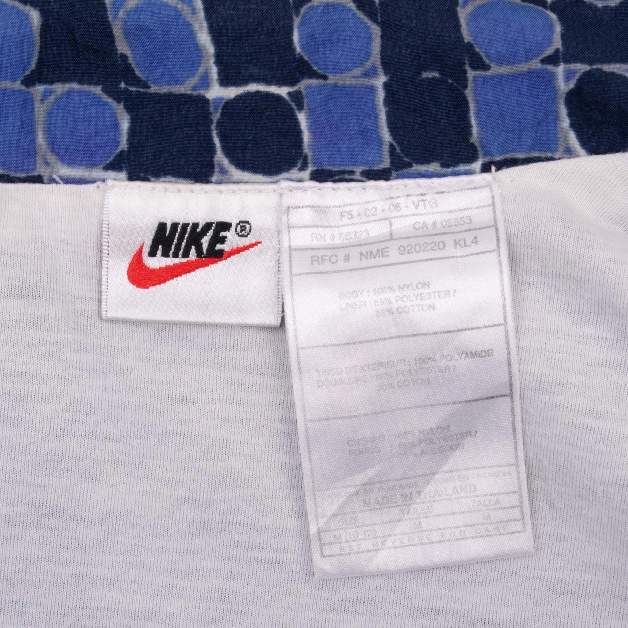 VINTAGE NIKE CLASSIC SWOOSH BLUE WINDBREAKER WOMAN JACKET 1990S SIZE MEDIUM